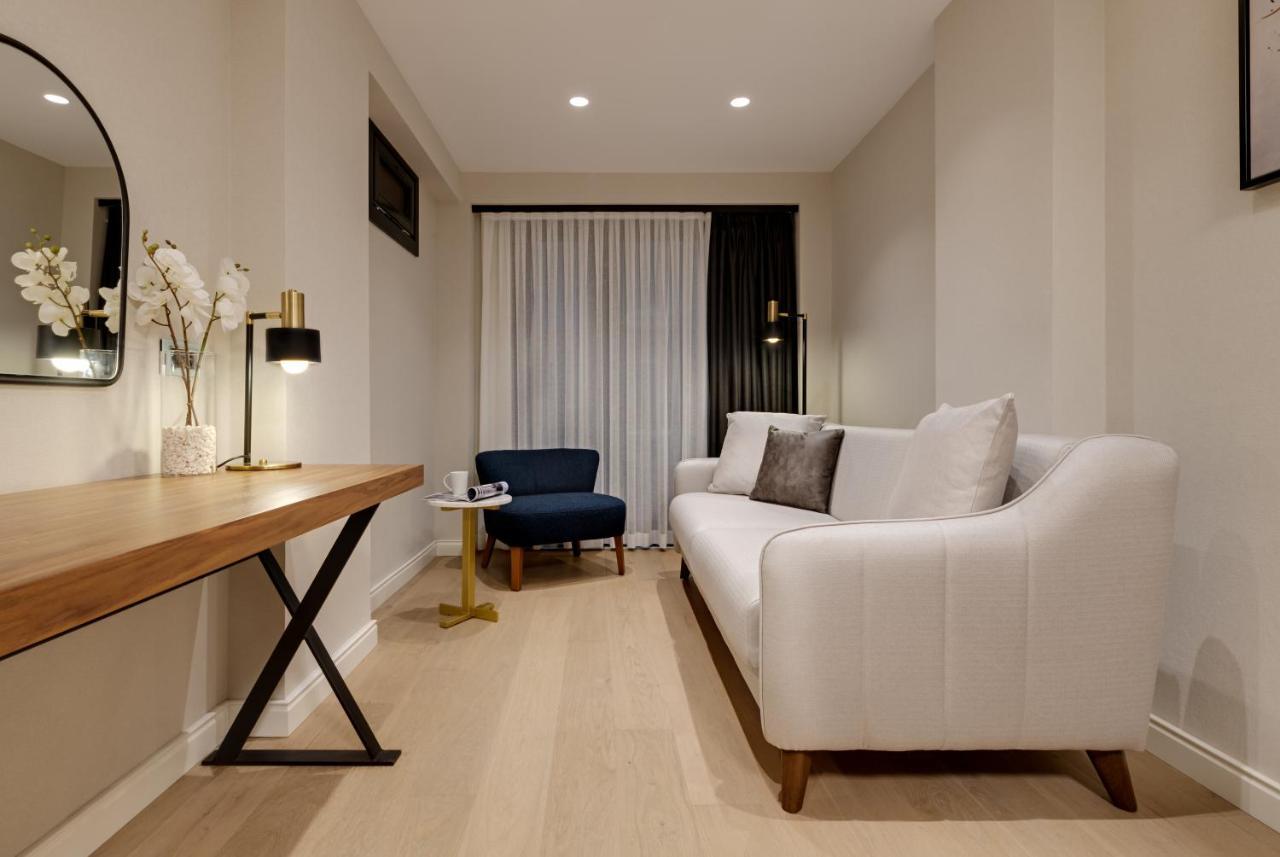 Gleam Collection Hotel اسطنبول المظهر الخارجي الصورة A living room in a micro apartment