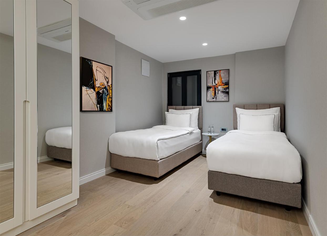 Gleam Collection Hotel اسطنبول المظهر الخارجي الصورة A bedroom at the hotel